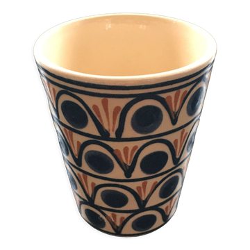 Ceramic cup with signed decoration