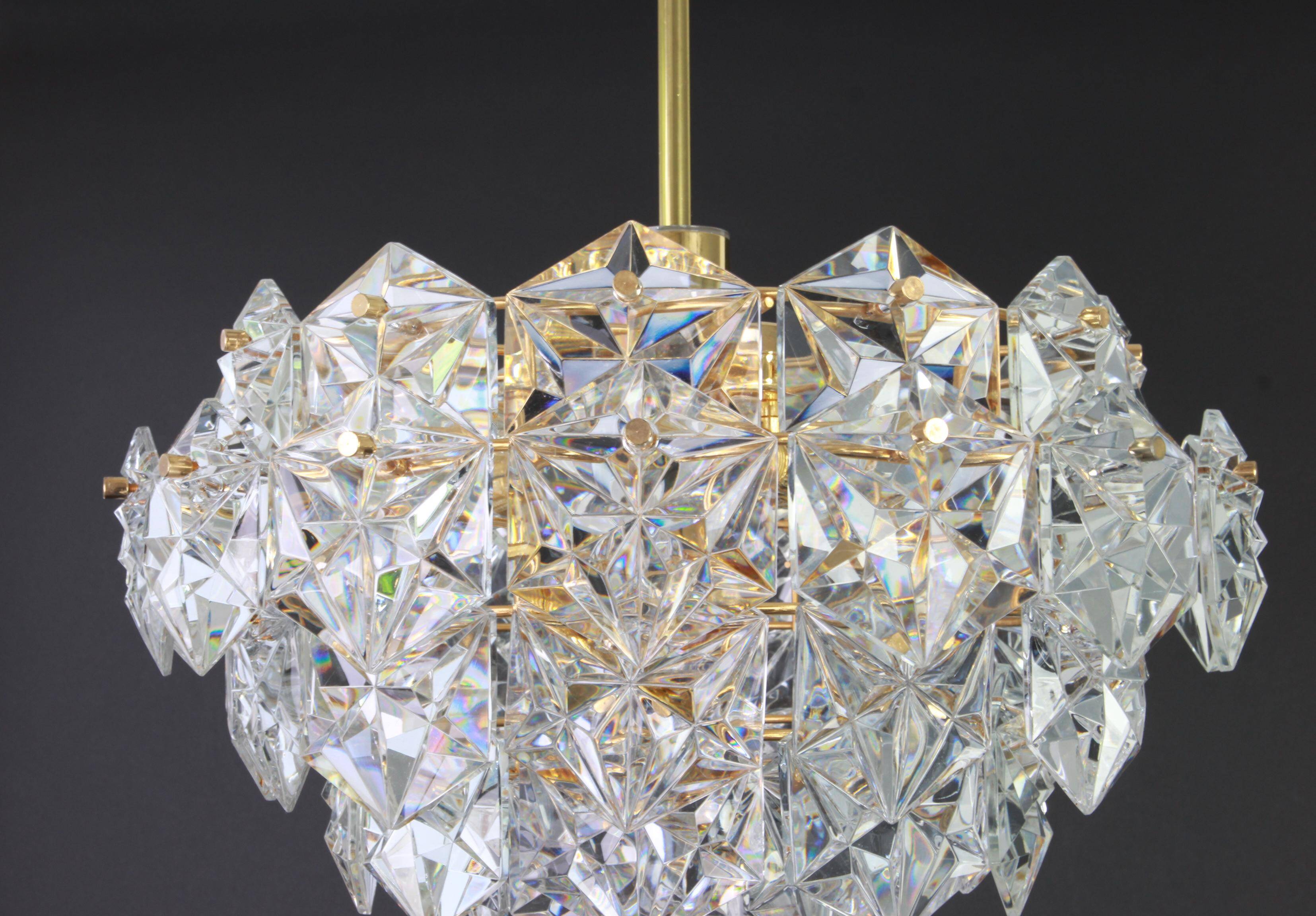 Golden brass and crystal glass chandelier by Kinkeldey, Germany, 1970s.