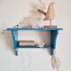 Blue wood wall shelf