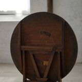 Round table with a tilting top from a 19th-century provincial French winemaker in oak.