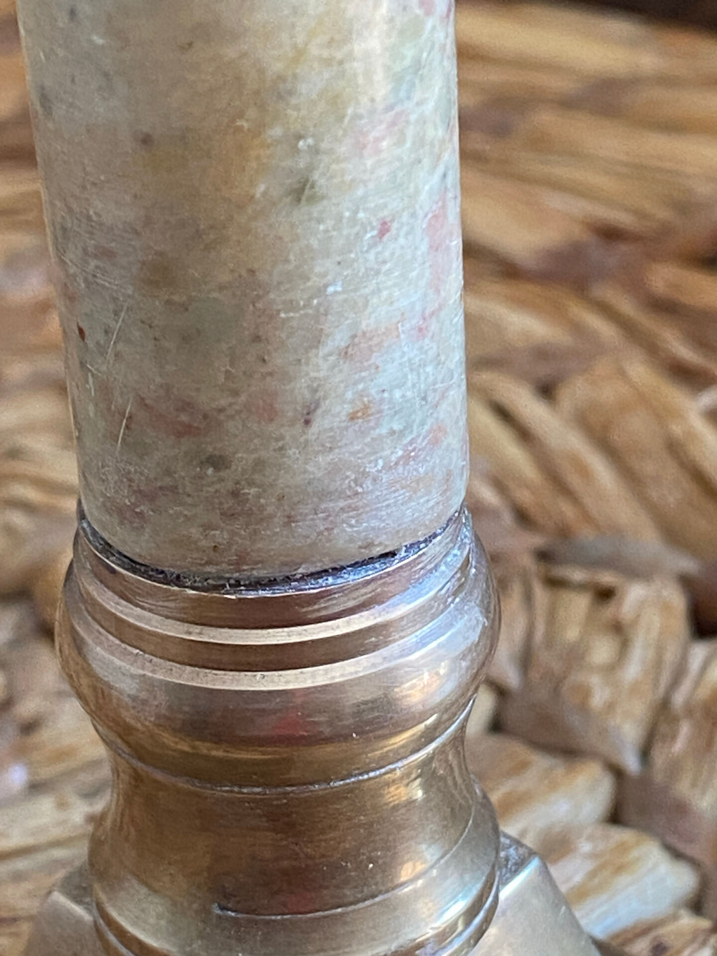 Pair of brass and stone candlesticks