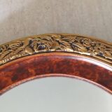 Modern oval mirror with flower decoration