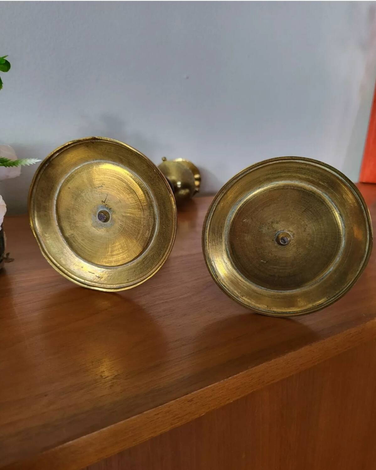 Pair of brass and black hard stone candlesticks