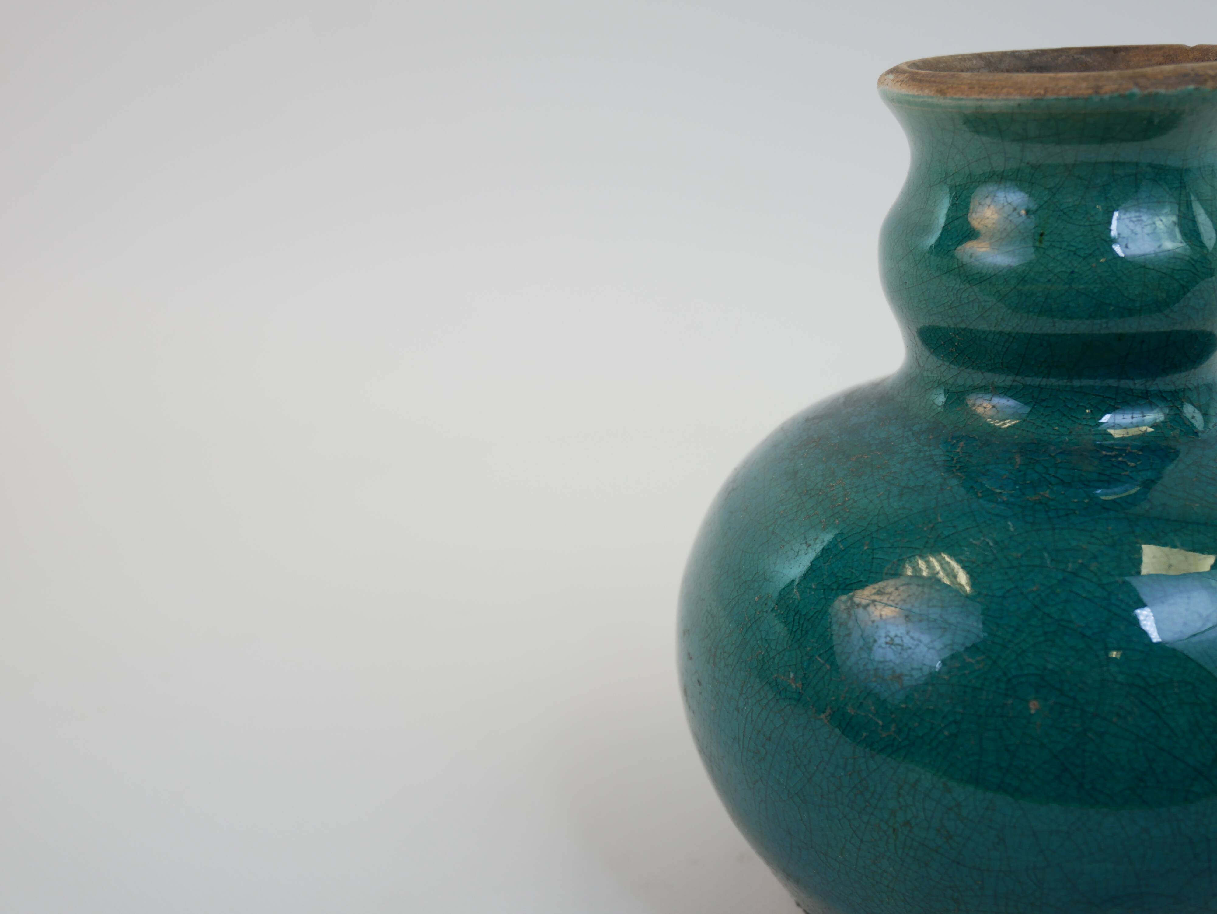 Small old blue ceramic vase