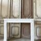 Louis XVI fireplace in white marble, 19th century.