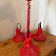 Three-lamp suspension in Memphis design style in red metal.