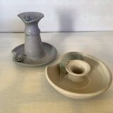 Pair of signed ceramic candlesticks