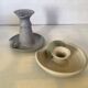 Pair of signed ceramic candlesticks