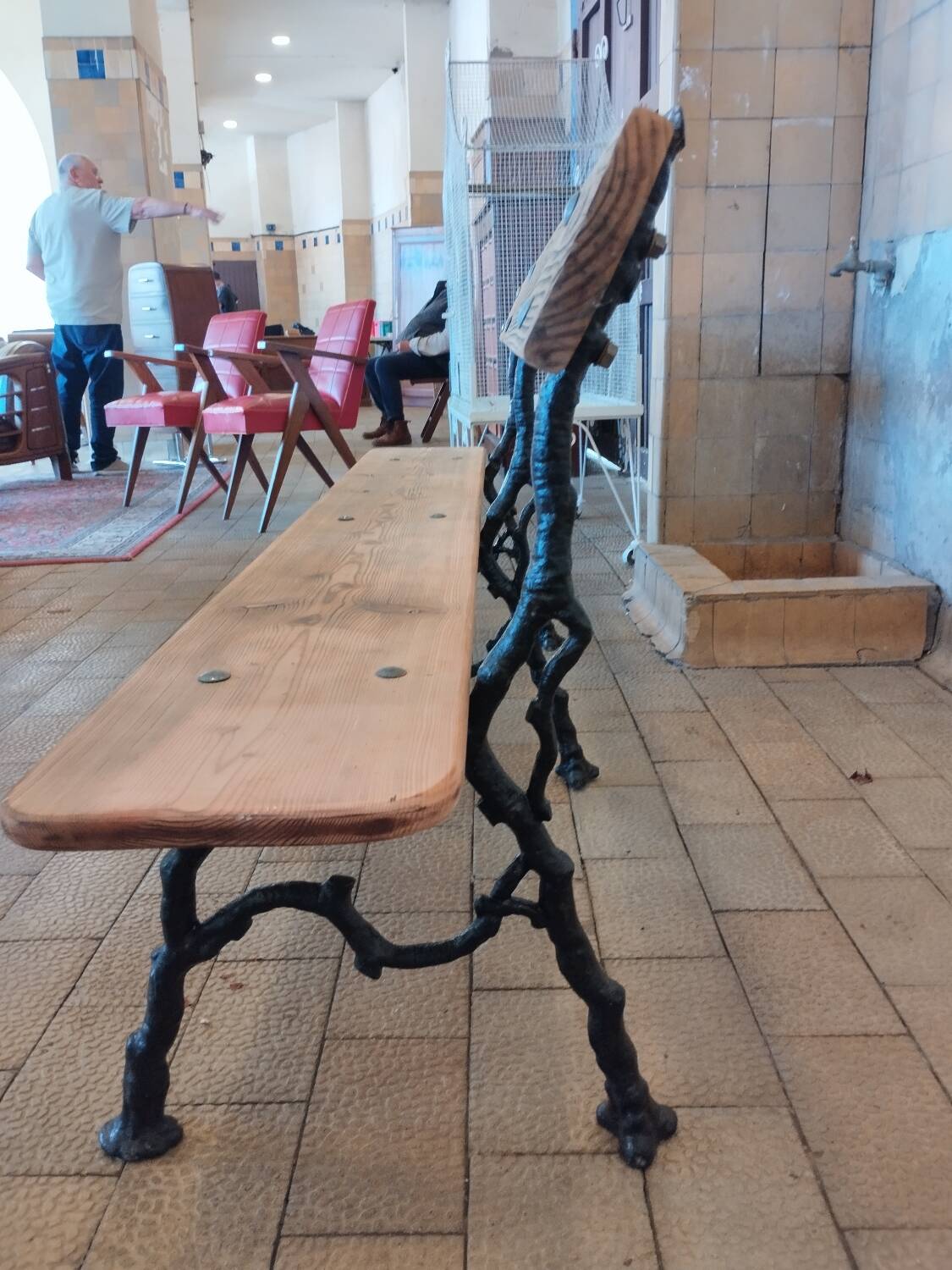 Antique garden bench with cast iron legs