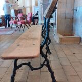 Antique garden bench with cast iron legs