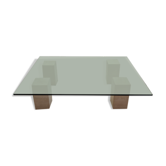 Table en verre et pieds en travertin