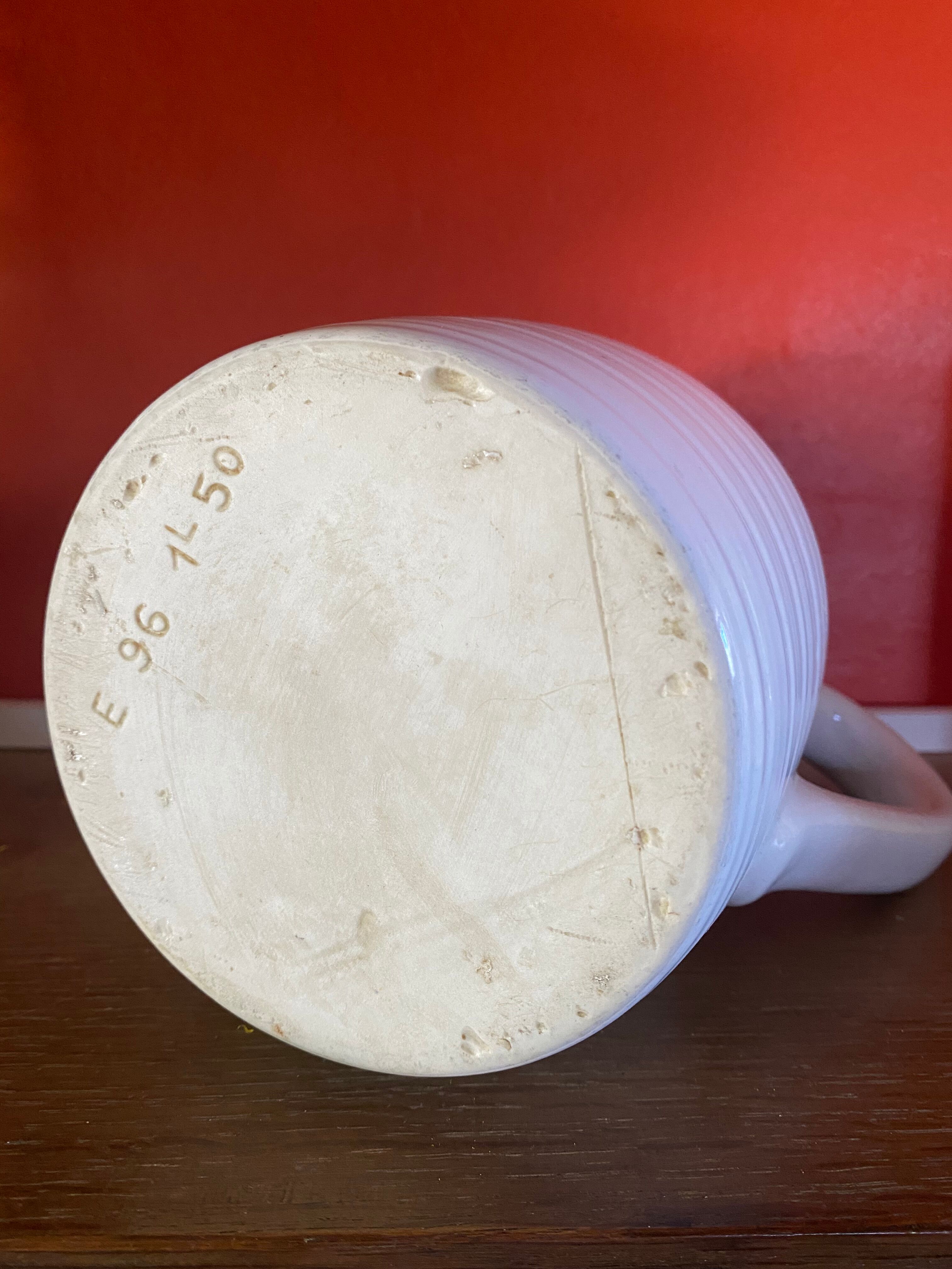 Large white ceramic pitcher