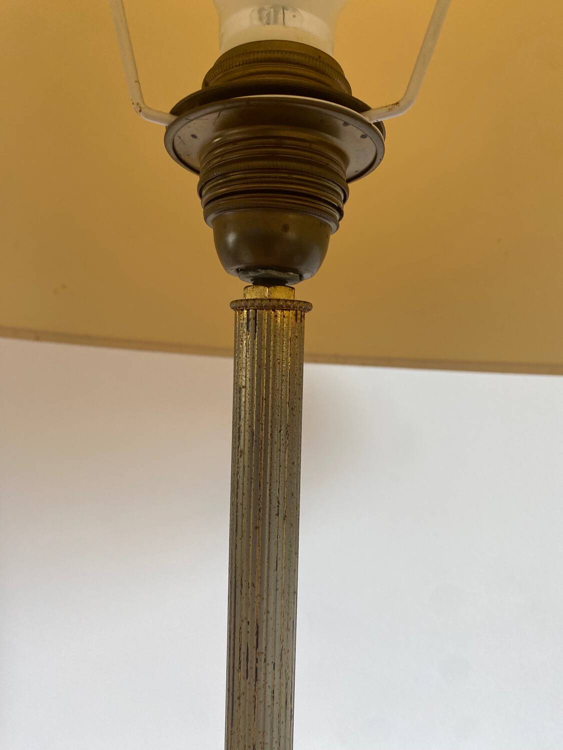 Gold-colored iron floor lamp