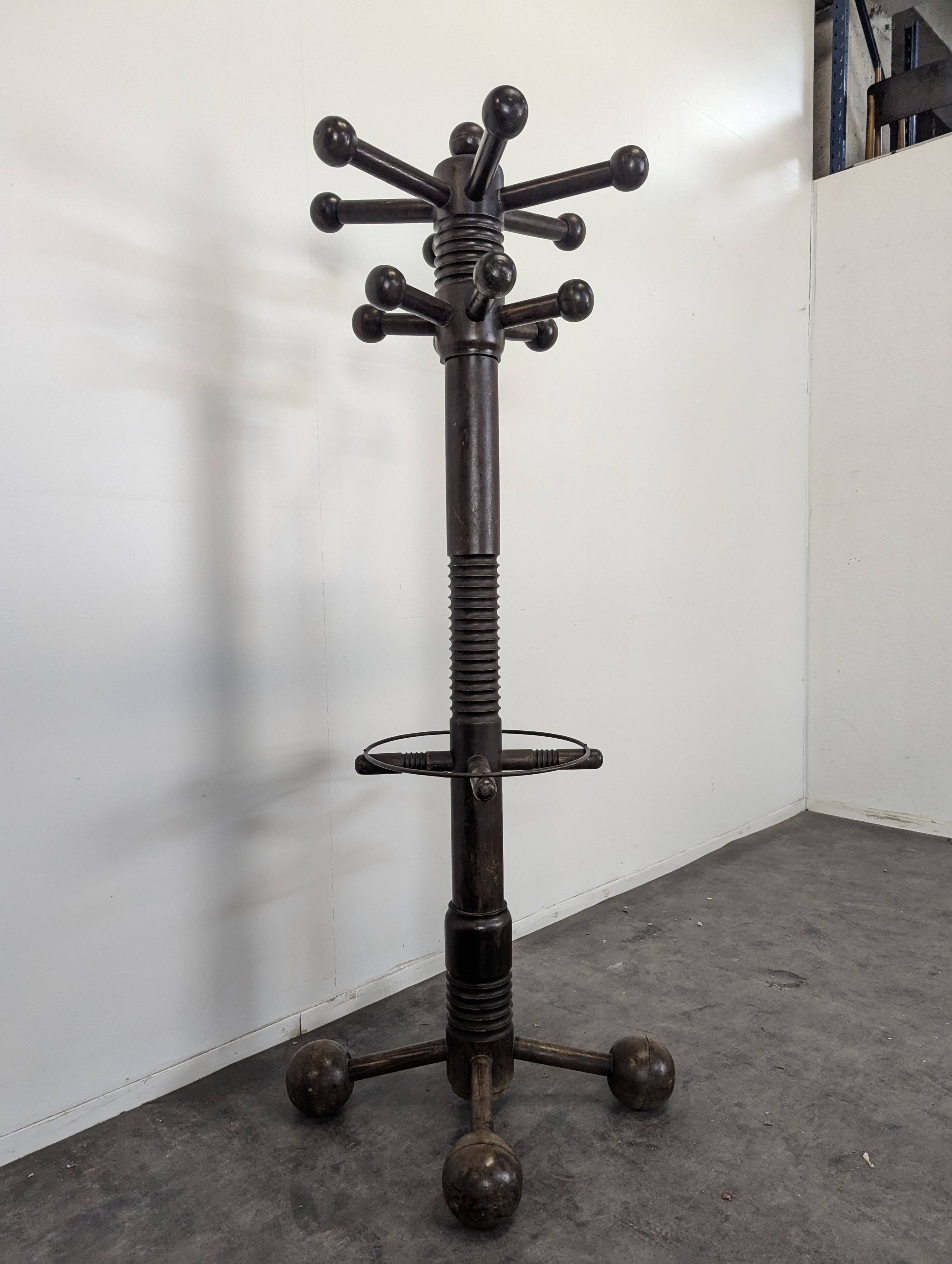 Coat rack by Charles Dudouyt in solid oak.