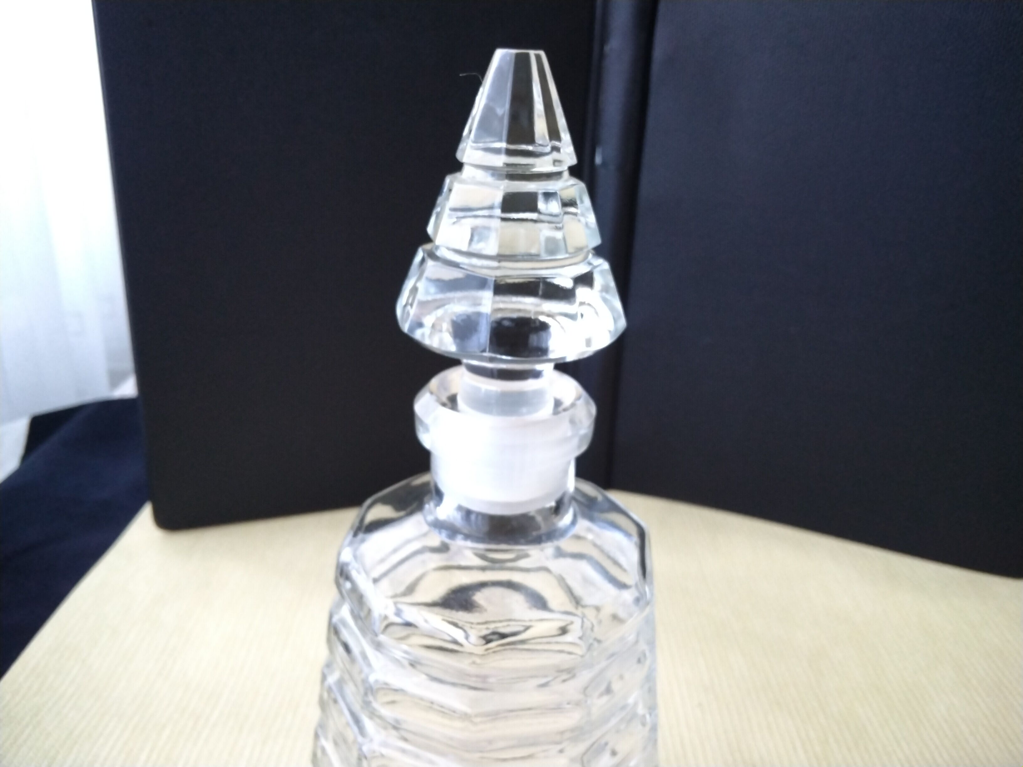 Glass perfume or eau de toilette bottle