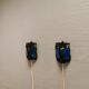 Wall lamps made of black cast iron and handmade thick pressed blue glass