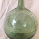 Demijohn old transparent green, estimated capacity around 12 to 15L