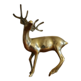 Young golden brass deer
