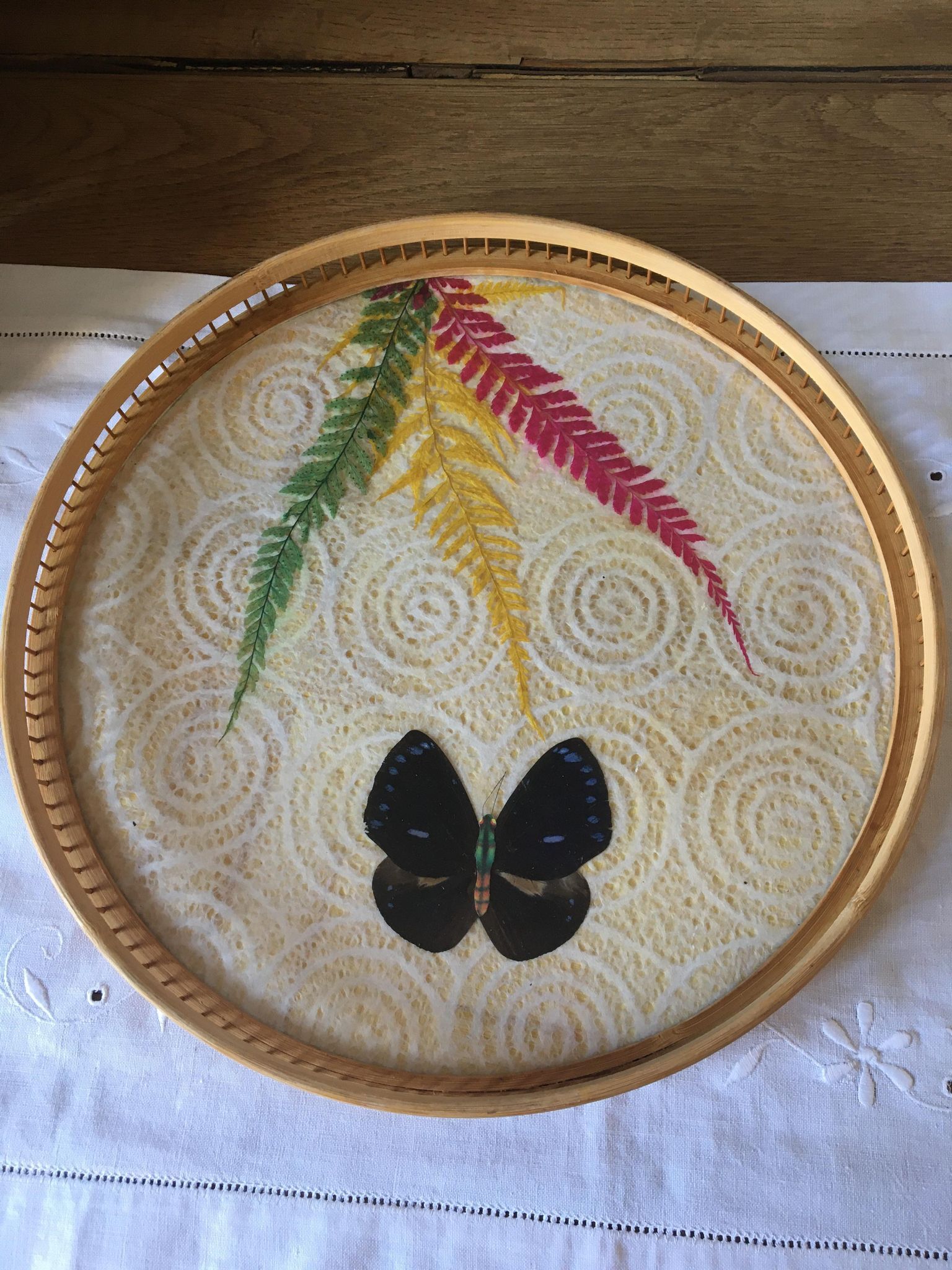 Vintage bamboo tray decorated with ferns and butterflies