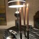 Three silver metal candle holders