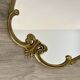 Vintage and rare gilt brass medallion/oblong/olave/rococo mirror