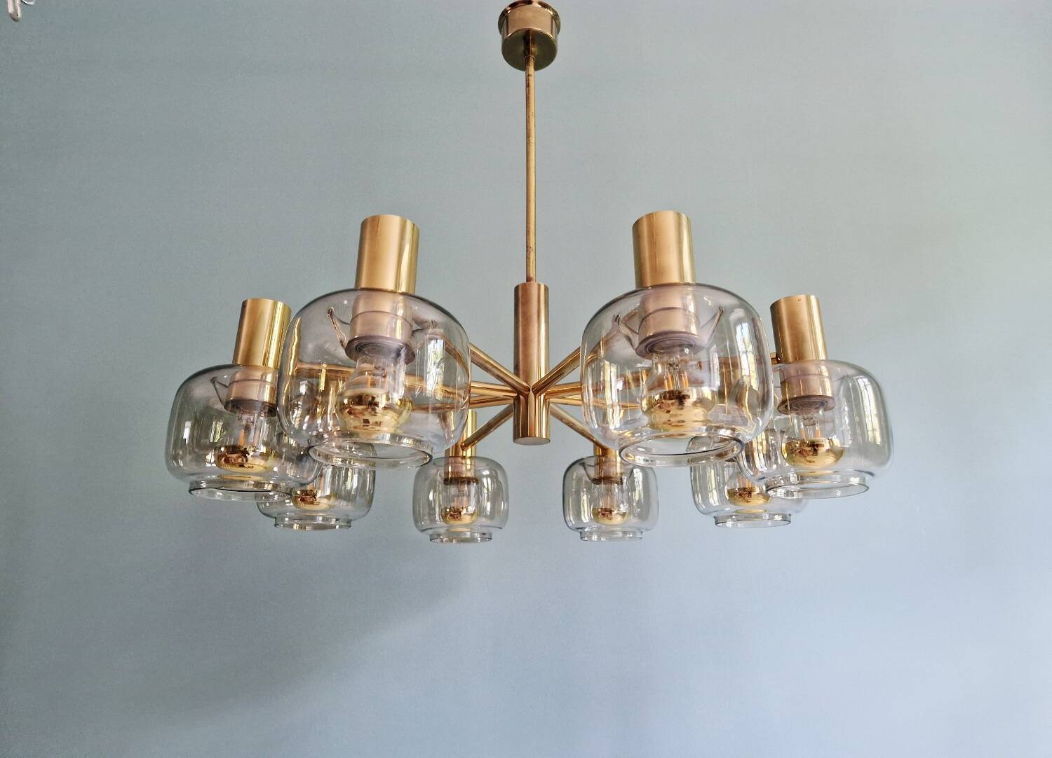 Large designer chandelier in brass and smoked glass globes, 1970s