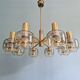Large designer chandelier in brass and smoked glass globes, 1970s
