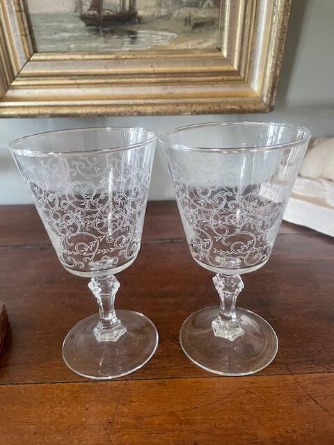 2 large engraved water glasses in arabesque.