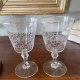 2 large engraved water glasses in arabesque.