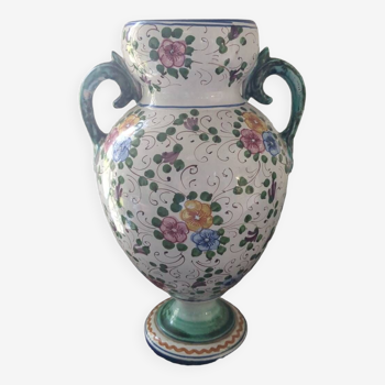 Old porcelain earthenware vase with floral decor