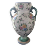 Old porcelain earthenware vase with floral decor