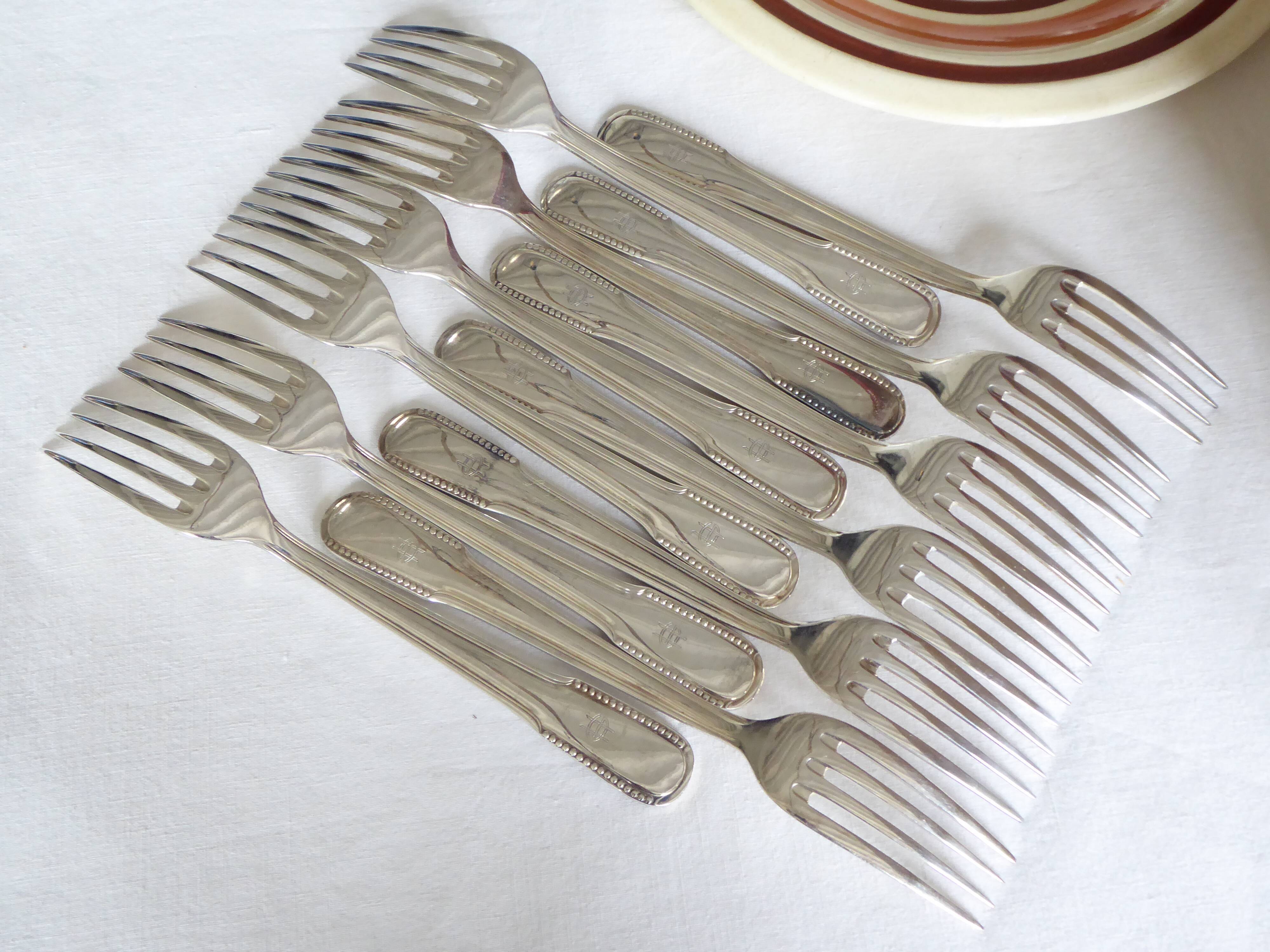 12 dessert forks, silver metal