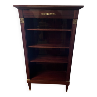 Directoire style bookcase in mahogany, decorated with gilded bronze.