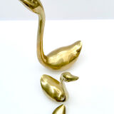 3 golden decorative swans