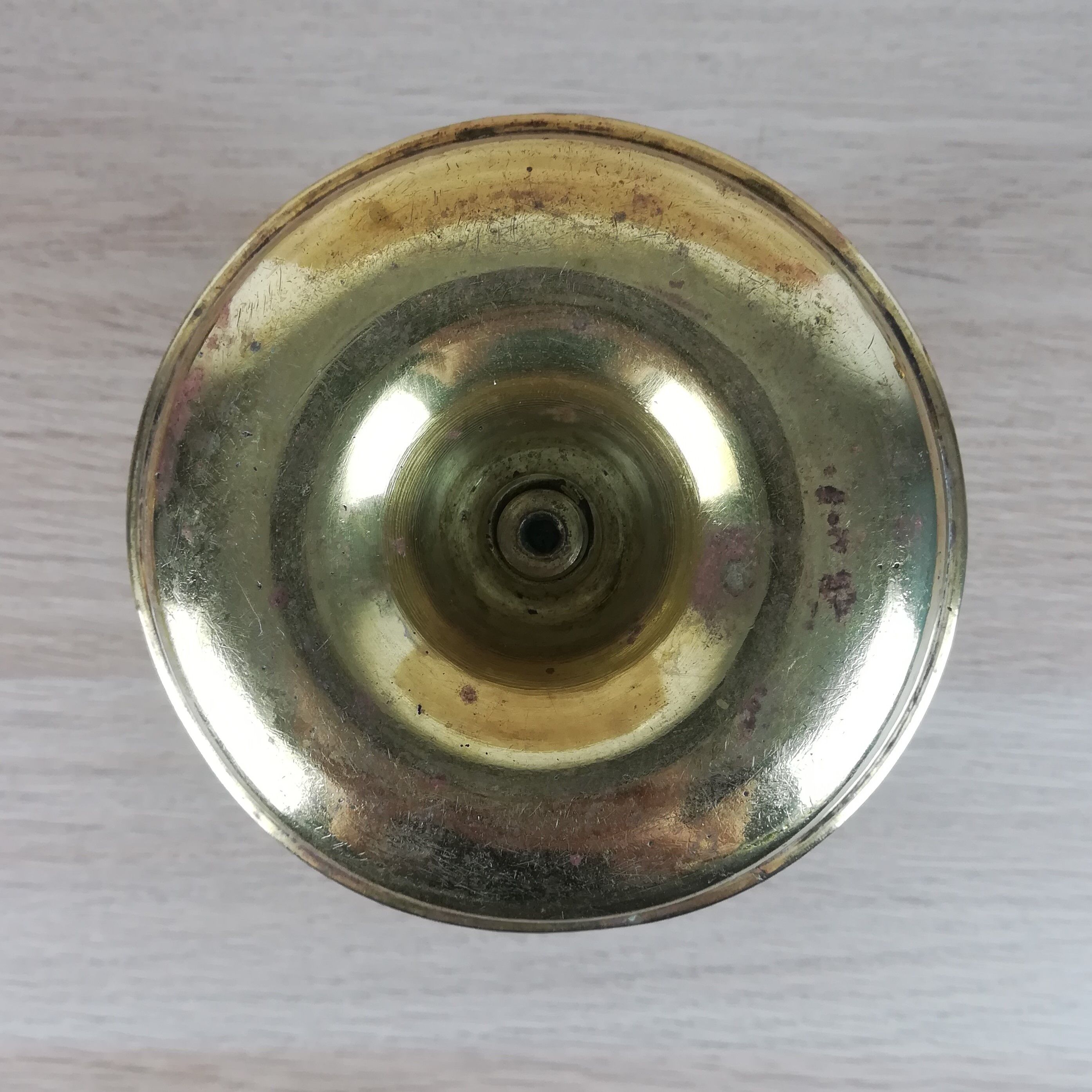 Brass pusher candle holder