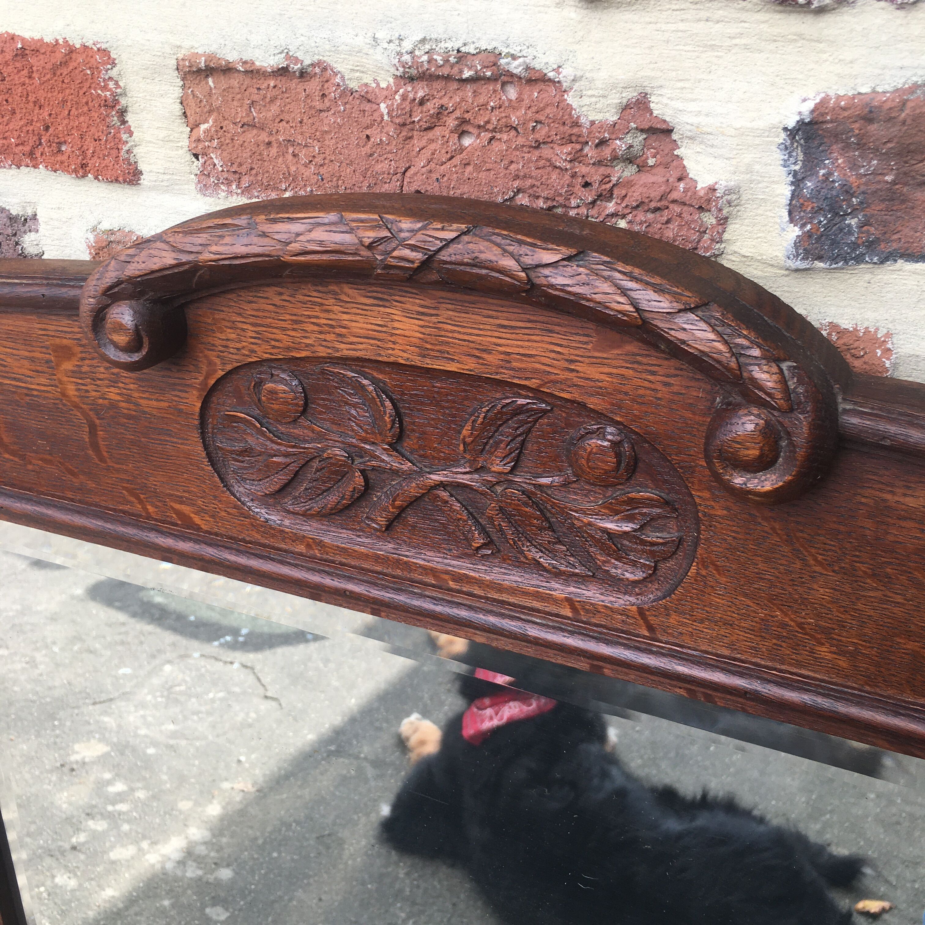 Beveled mirror made of fireplace wood