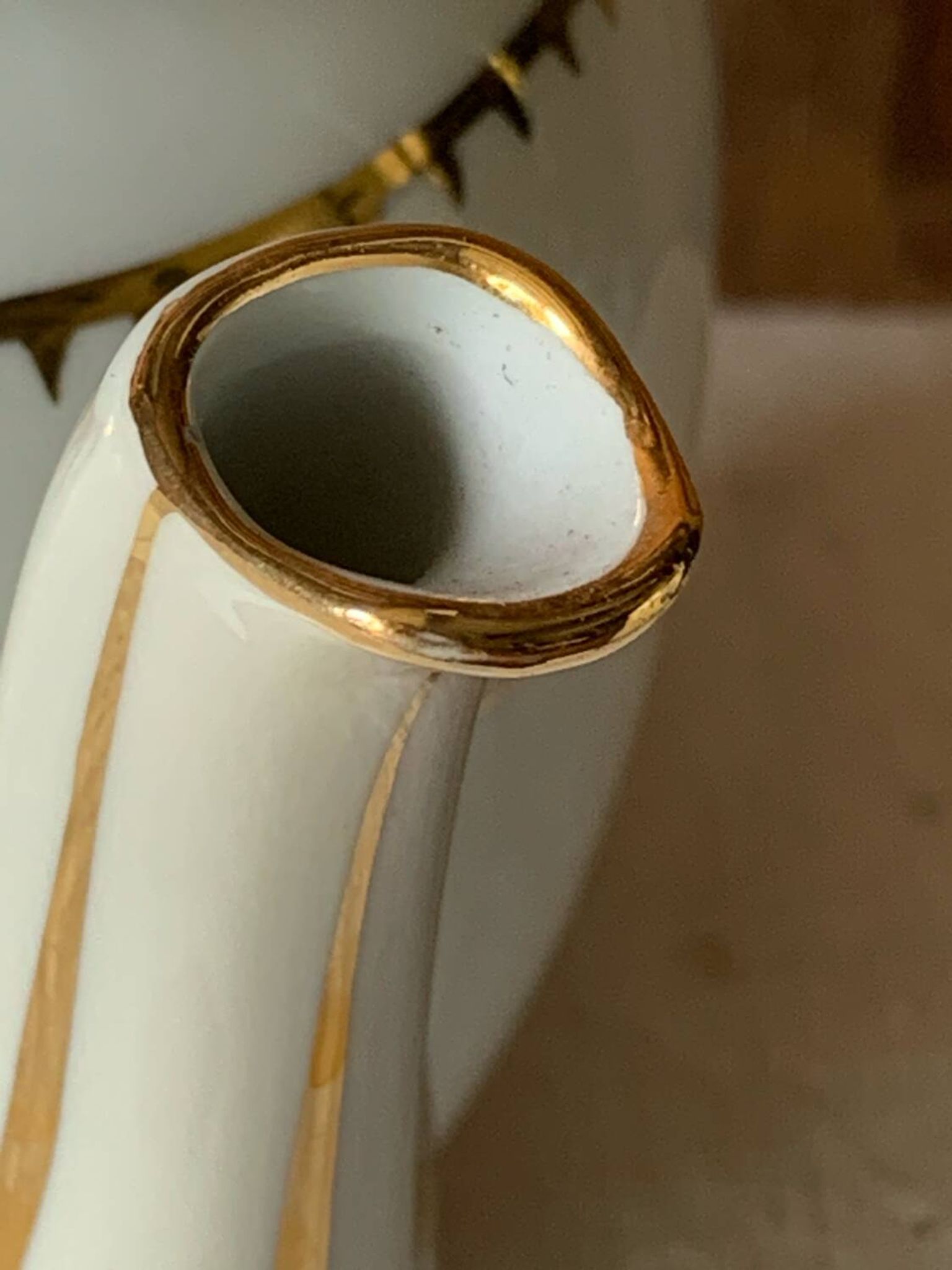 Antique porcelain jug with Limoges enamel
