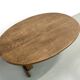 Oval table with T-shaped legs, solid oak, student woodworking project.