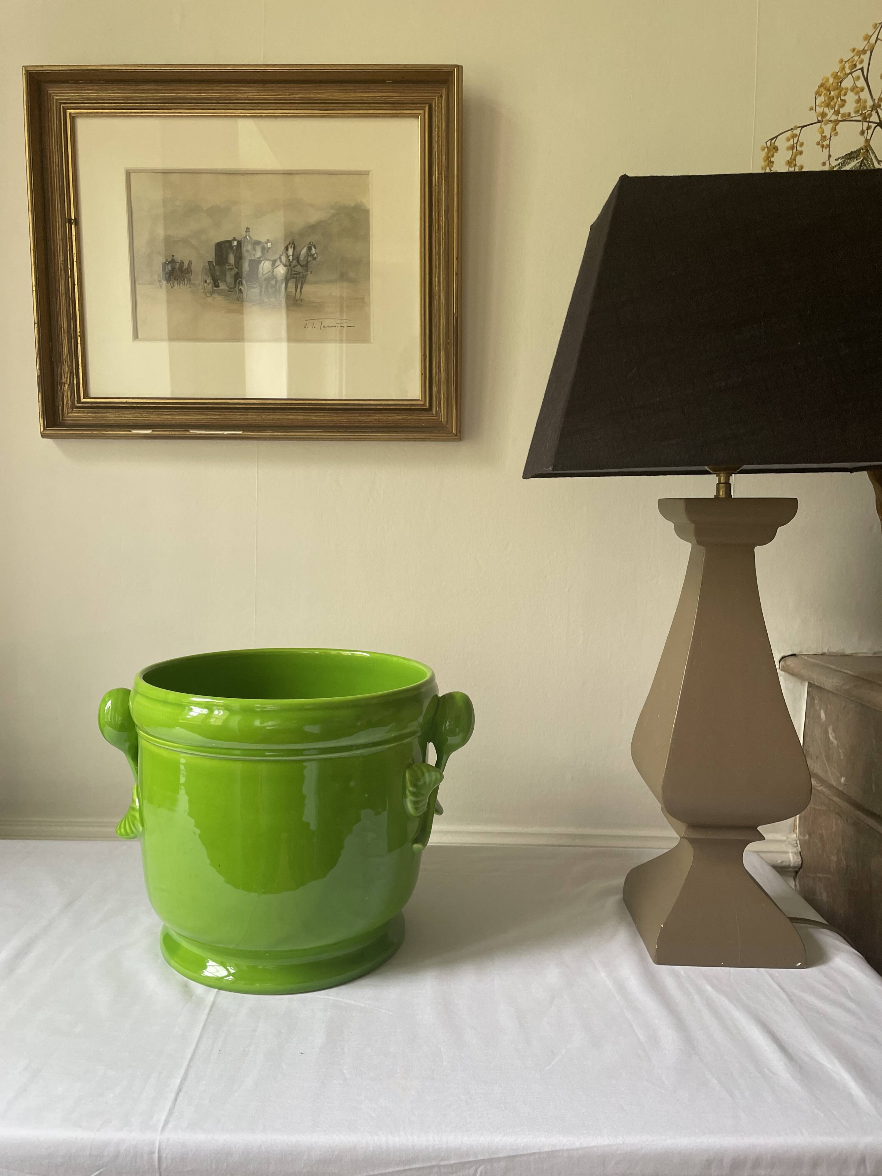 Glazed green pot cover in the style of Moreau Bourg earthenware