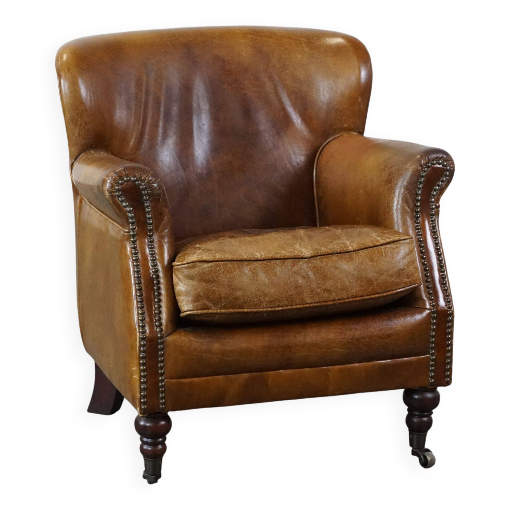 Cognac-colored subtle armchair
