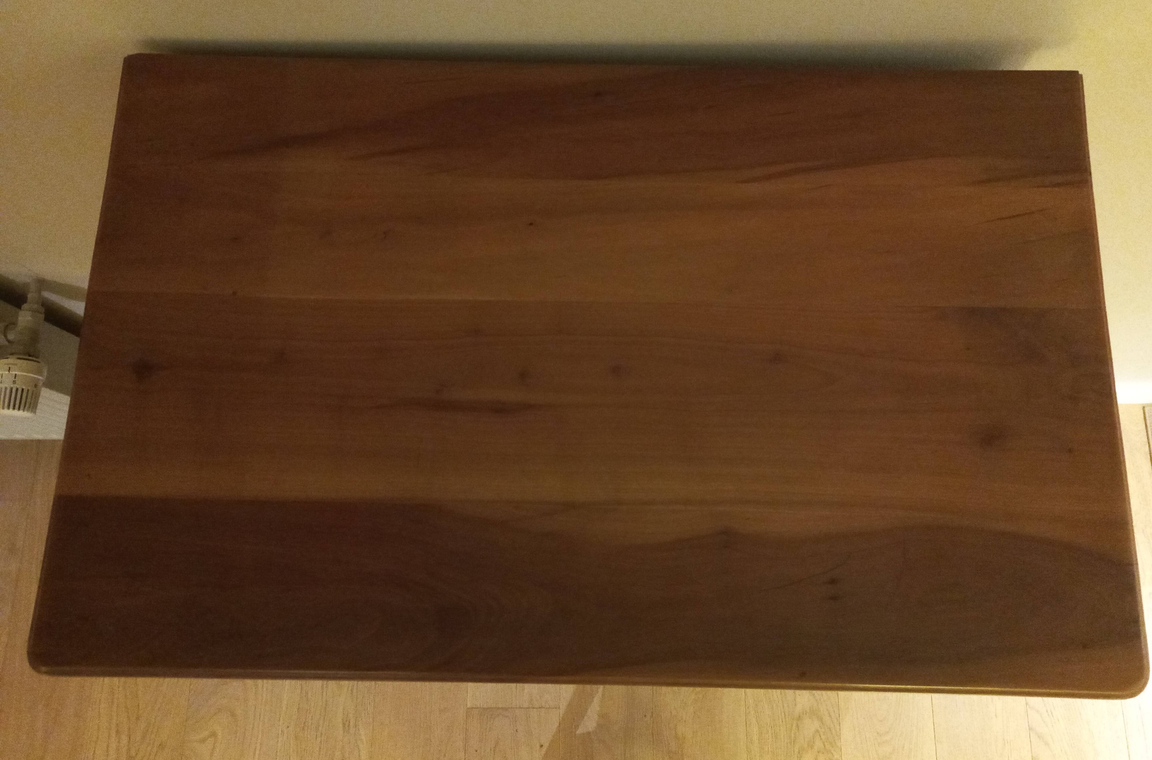 Small table and cherry wood sideboard.