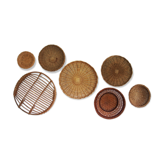Wall composition of 7 rattan and wicker baskets