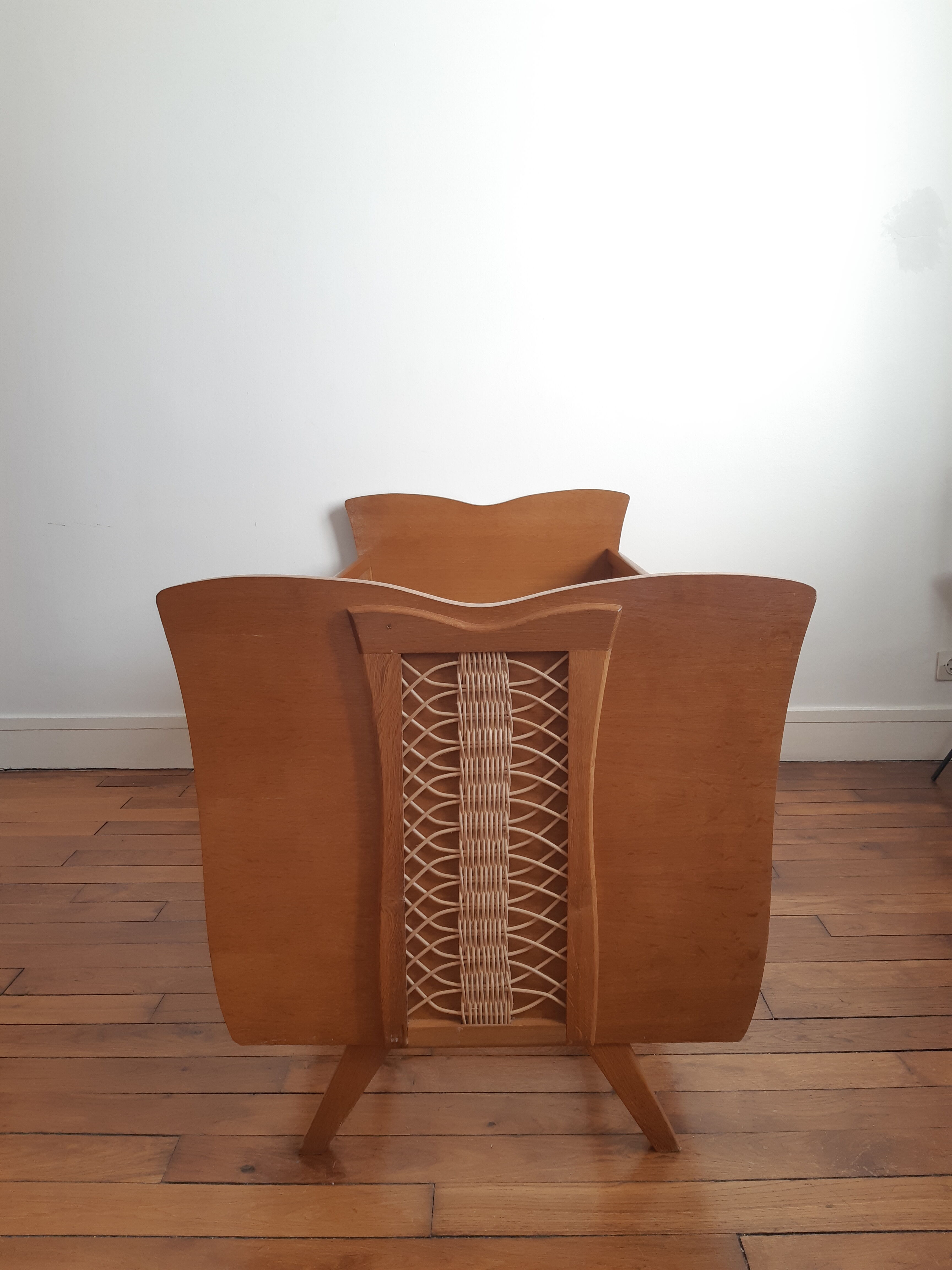 Wooden bed and vintage rattan