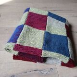 Hand knitted patchwork plaid