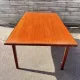 Rectangular extendable table in Scandinavian style made of teak.