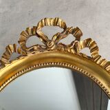 Gilded mirror with pediment