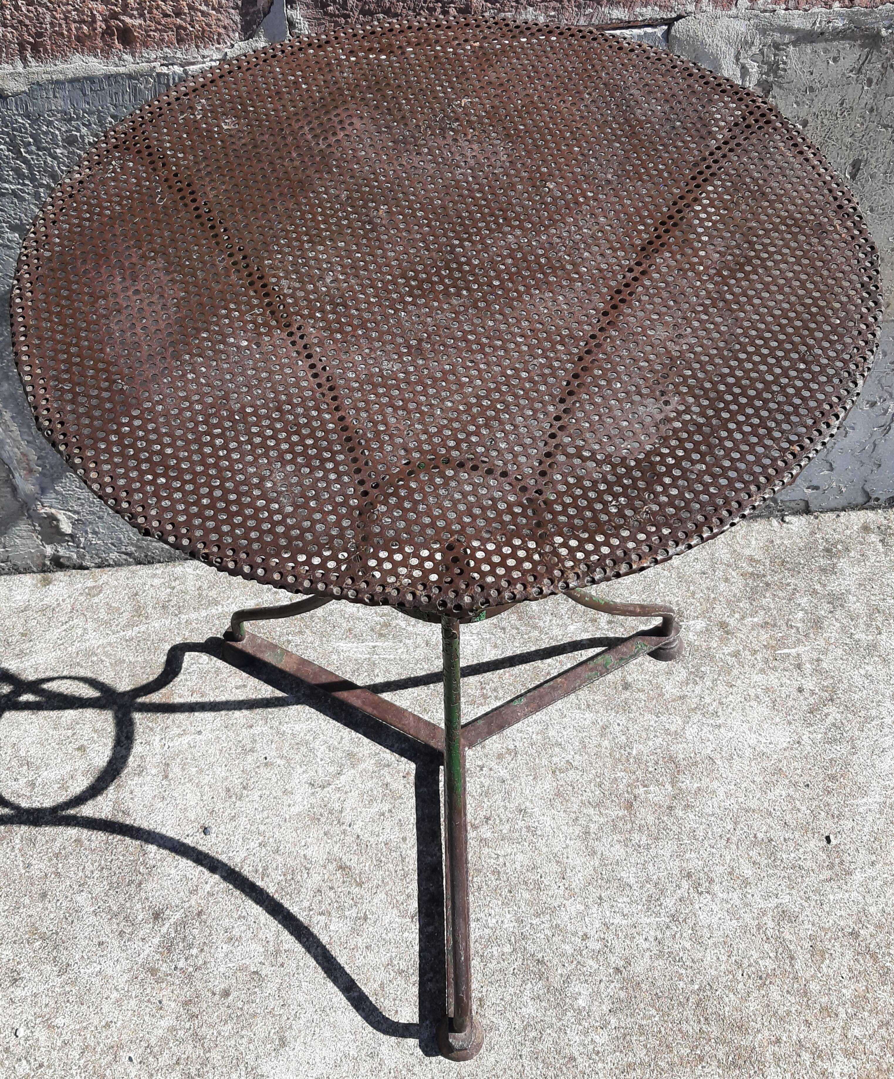 Wrought iron pedestal table