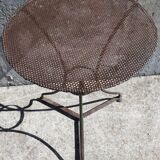 Wrought iron pedestal table