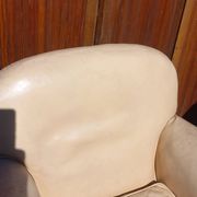 Pair of 1930s club armchairs in ivory leather.