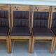6 High-back chairs in high-quality, plush solid wood with brown faux leather